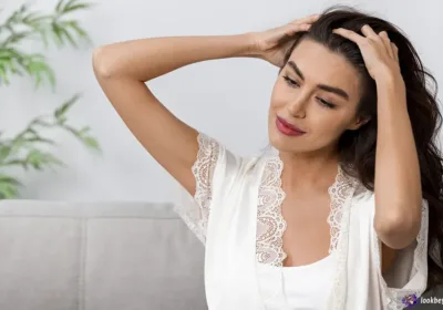Woman scratching head dry scalp vs dandruff